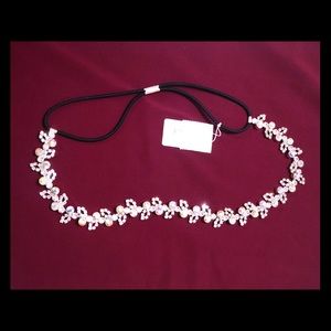 Crystal embellished headband.